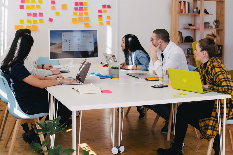 Colleagues attend a virtual meeting