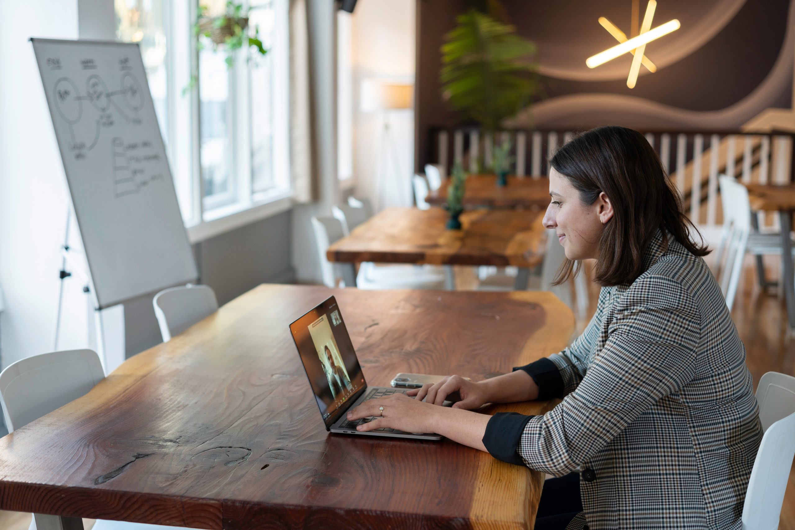 Lady attending a virtual meeting