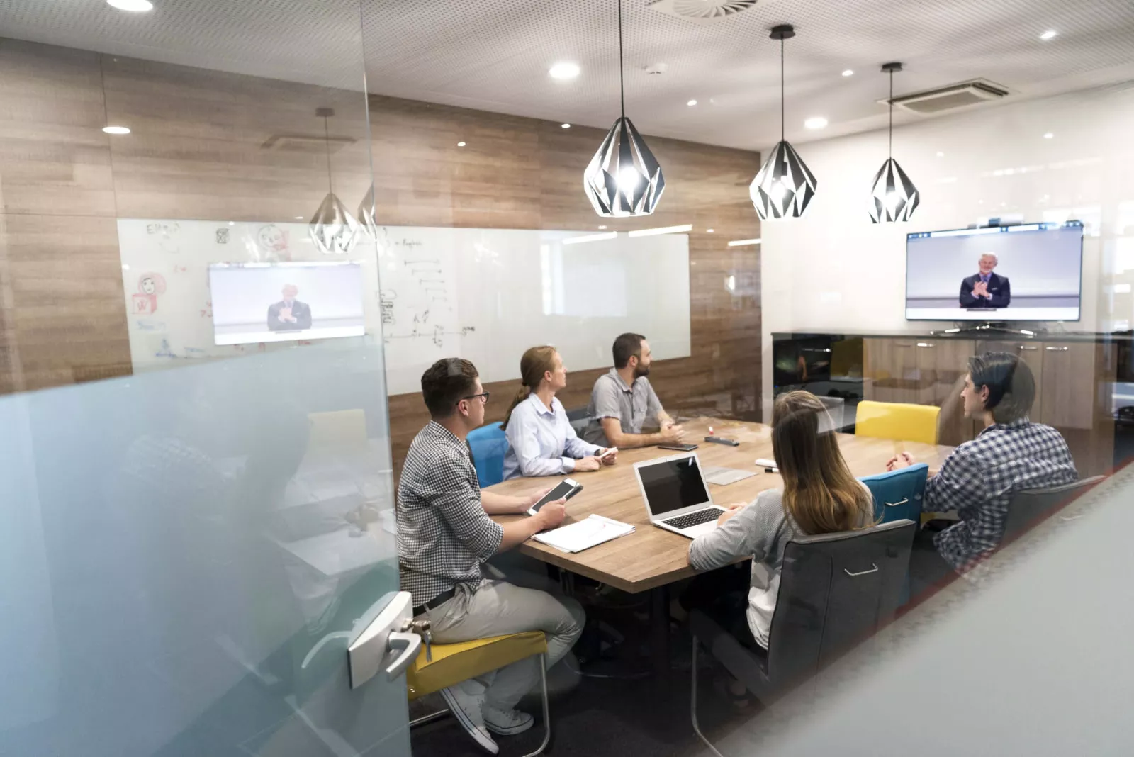 A hybrid office meeting using digital technology